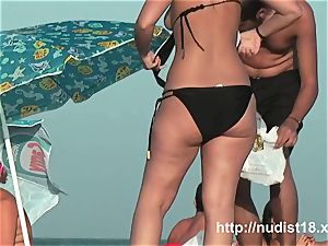 naked beach hidden cam flick of super-hot playful nudists in water